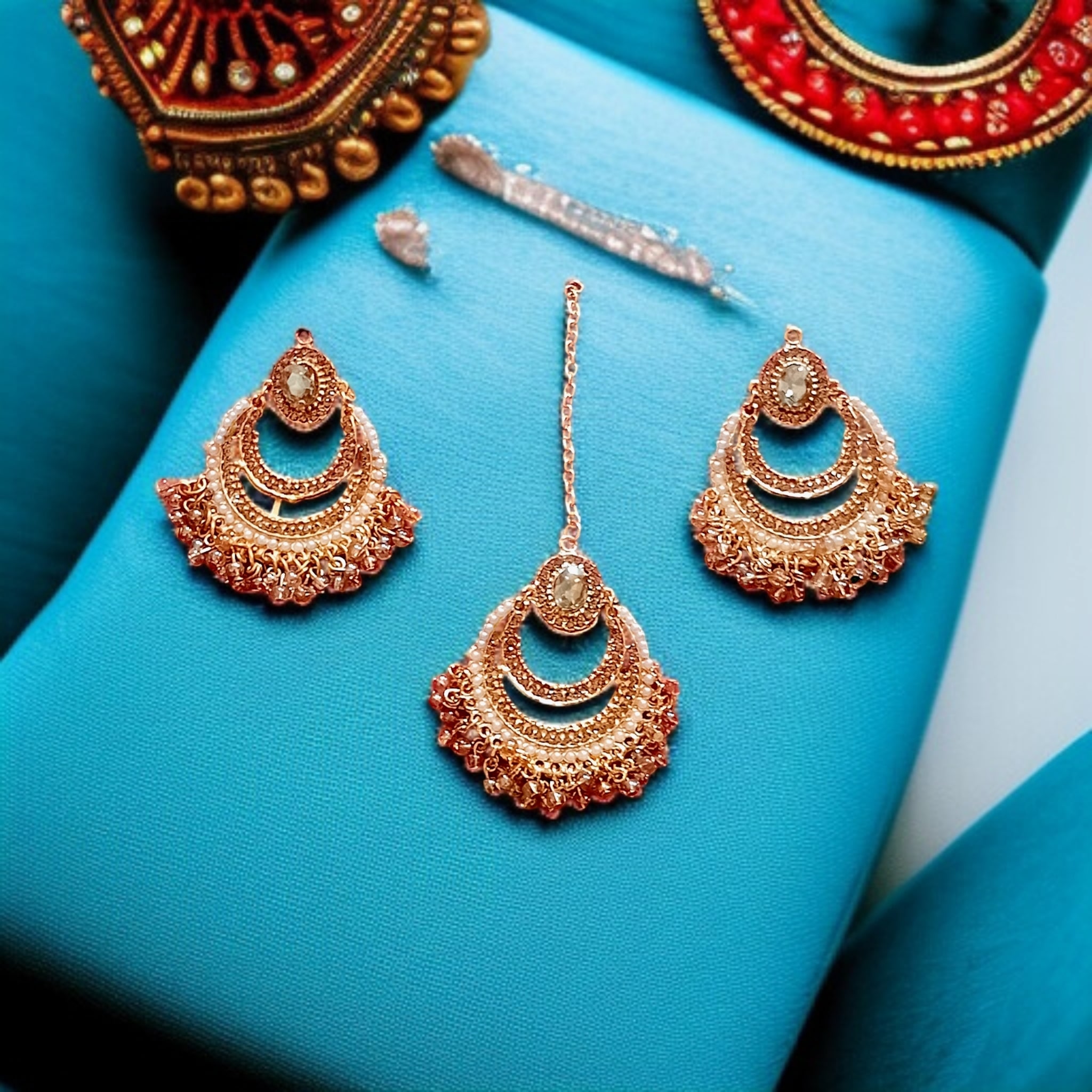 Buy Golden colour jewellery earrings and tikka at best price in Pakistan